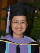 Photo of Dr. Huynh-Le in a graduation cap and gown.